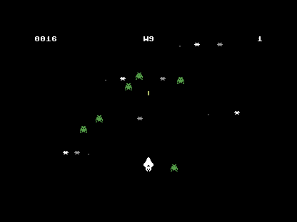 Wave 9: six green enemies spread across the field homing on the ship, the readout at W9, score 0016.
