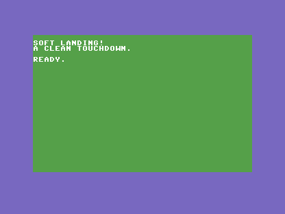 A C64 screen, green background, white text reading SOFT LANDING! and A CLEAN TOUCHDOWN.