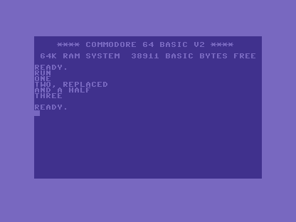 The C64 screen showing ONE, TWO, REPLACED, AND A HALF, THREE.