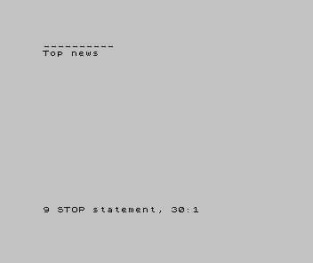 A Spectrum screen showing a line of dashes, then Top news.