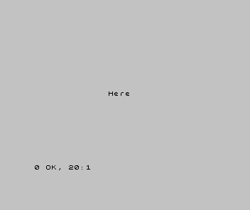 The Spectrum screen showing the word Here near the centre, with the report 0 OK, 20:1.