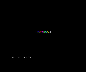 The Spectrum screen showing the word RAINBOW with each letter in a different colour, on black.