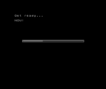 Black ZX Spectrum screen with Get ready... and NOW! above a thin horizontal frame with a bar filling it partway across