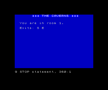 ZX Spectrum screen titled THE CAVERNS, reading 'You are in room 1.' and 'Exits: S E' in white on dark blue