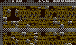 Rockford stands beside a newly dug vertical passage and a changed arrangement of nearby boulders in the first cave