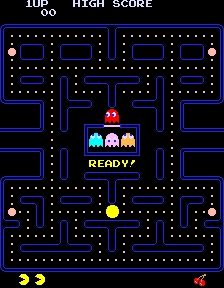 The arcade maze before play begins, with dots, four power pellets, Pac-Man and the ghosts visible
